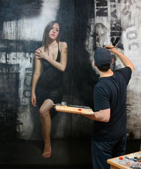 Artist creating realistic art walls